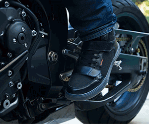 Zapatos para motocicleta con luz intermitente y freno