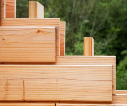 Ladrillos de construcción de casas de madera